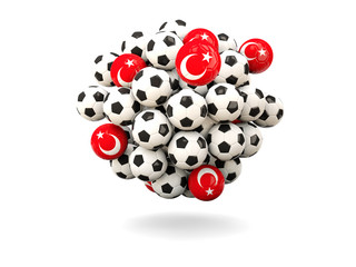 Pile of footballs with flag of turkey
