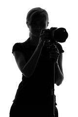 silhouette of a woman with a camera