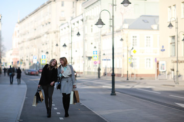 Two girlfriend, Autumn portrait of a walk in the city