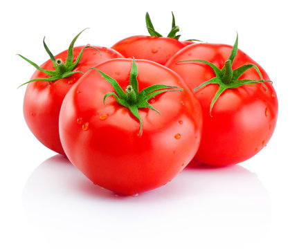 Juicy ripe red tomatoes isolated on white background