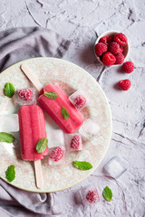 Homemade raspberry popsicles