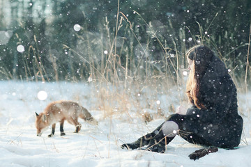 Girl and fox winter portrait