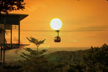 Outdoor-Kissen Cable car on the  mountain sunset background © napatcha