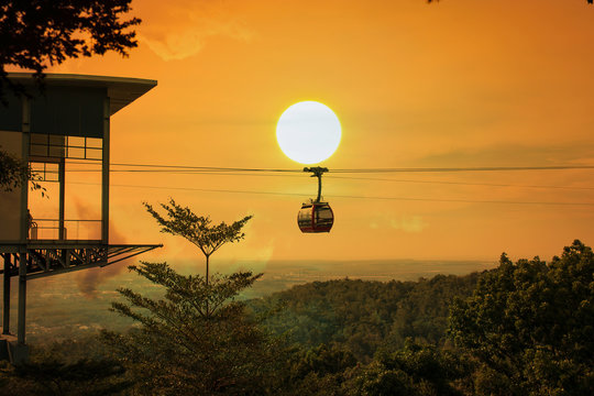 Cable Car On The  Mountain Sunset Background