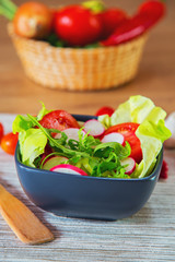 Tasty salad served in a bowl 