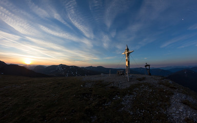Obraz premium Sunrise Hiking To Top Of Predigerstuhl 2.170. In The Nocky Mountains Of Carinthia Austria