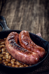 Grilled sausages with beans