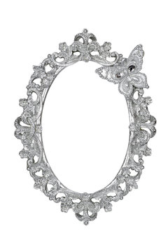 Oval silver picture frame with butterfly isolated with clipping path.