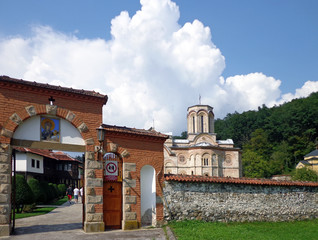 Gate, fence and the Church of the Monastery