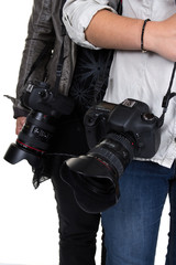 Two photographers holding camera isolated on white background