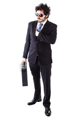 cool businessman with chained leather suitcase