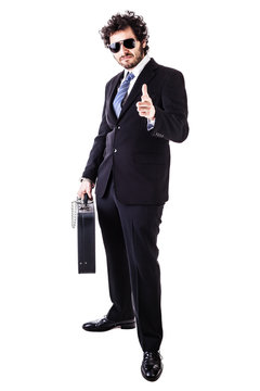 cool businessman with black suitcase