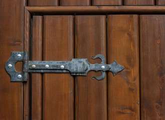 The hinge door bracket metal retro vintage Gothic background texture wood varnished