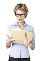young business woman reading reports.