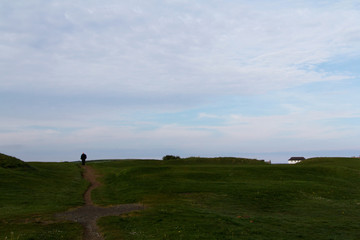 Fototapeta premium Path through golf course shot at dawn