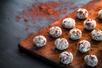 Small chocolate cakes on a cutting board