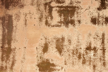 Old colored beige rusty metal texture background 