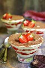 Traditional italian dessert tiramisu with strawberry.