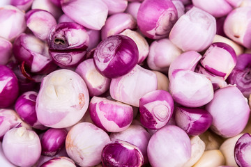 Closeup of peeled onion shallot and garlic