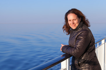 Caucasian woman on the deck of cruise ship