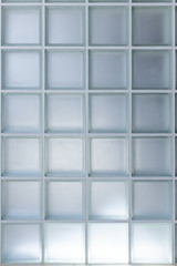 Part of the wall of frosted glass bricks.