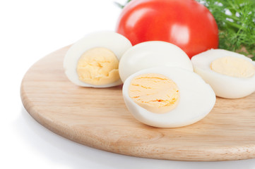 Boiled hen eggs and tomato