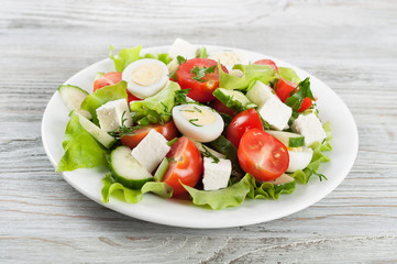 Fresh salad with quail eggs