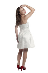 rear view of a teenager in white prom dress