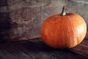 thanksgivings day pumpkin and candles