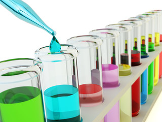 Chemistry, chemical experiment and science research concept, laboratory equipment: glass pipette dripping a drop of fluid to one of many test tubes with multicolored liquids on white background