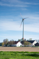 Fototapeta premium Windmill and agricultural buildings