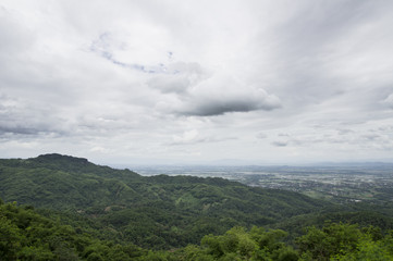 green field with a mountain view