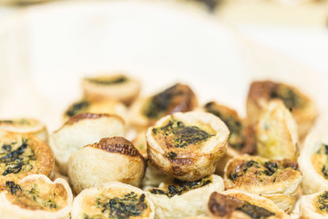 Many yellow veggies small tarts food close up
