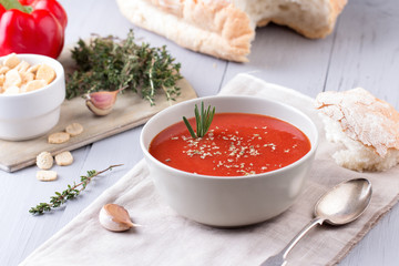 fresh tomato soup in a grey bowl