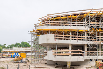 Construction site showing new building of apartments / construction of new flats using new materials and building techniques
