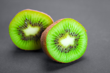 kiwi isolated on black background