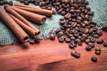 Coffee beans on wood background