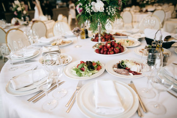 Restaurant table with food. Catering service.  Wedding celebration, decoration. Dinner time, lunch.