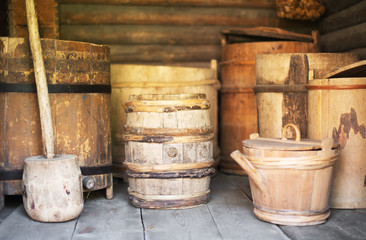 Naklejka premium Storage racks with old wooden barrels.
