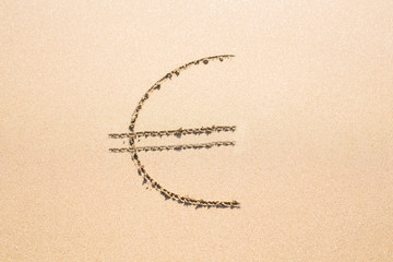 sign of the EURO currency drawn in the sand