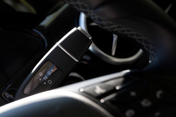 Gear controls lever in car interior