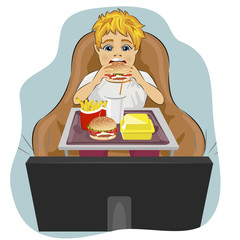 obese fat boy sits in chair eating hamburger and watching tv