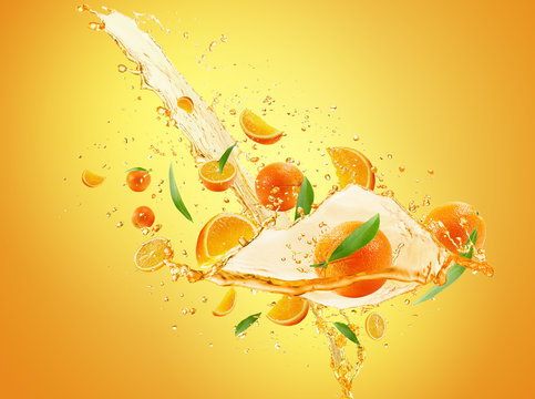 orange juice splash on the orange background