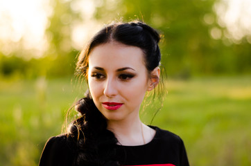 Naklejka premium beautiful girl portreit in the park