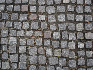Gray square stones paved road