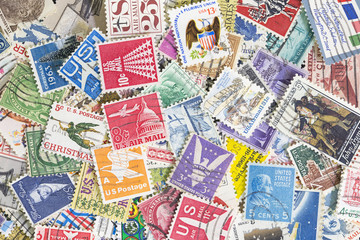 Collection of United States postage stamps - obrazy, fototapety, plakaty