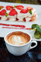 millefeuille with strawberry and coffee. Beautiful restaurant serving the dessert