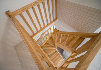 Modern interior. A wooden staircase in the interior of the house