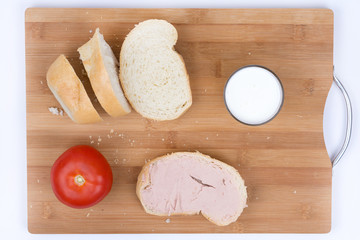 Breakfast bread with pate tomato glass of yogurt