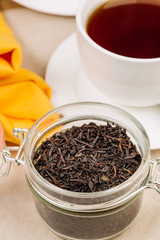 jar with black tea inside